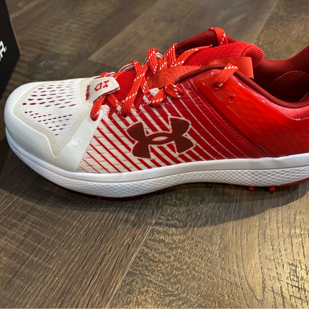 Under Armour Red and White Turf Shoes
Brand new